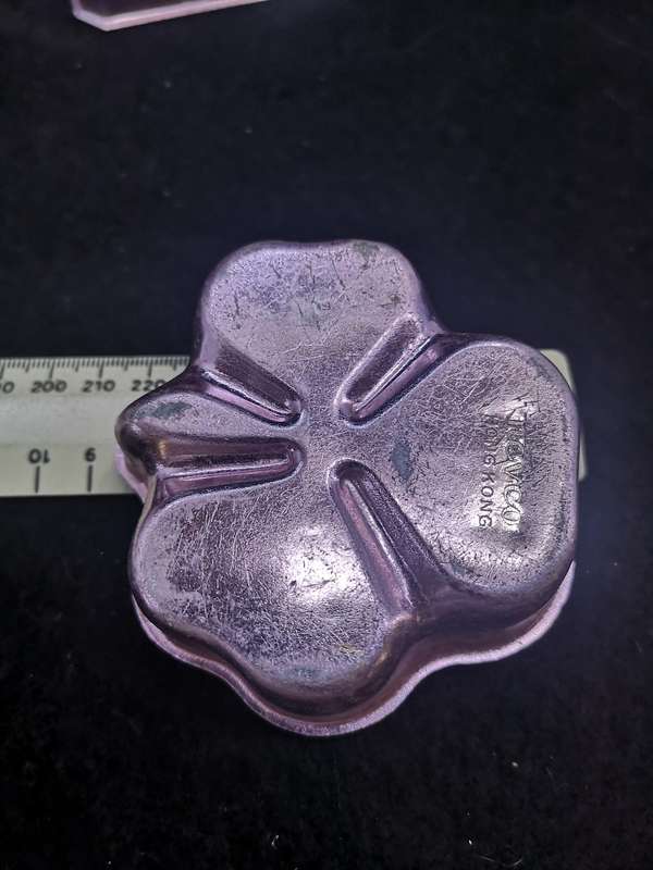 Vintage set of Nevco molds made in Hong Kong