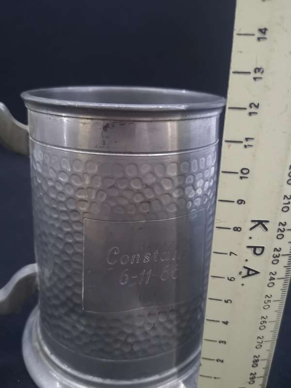 Glass bottom pewter tankard