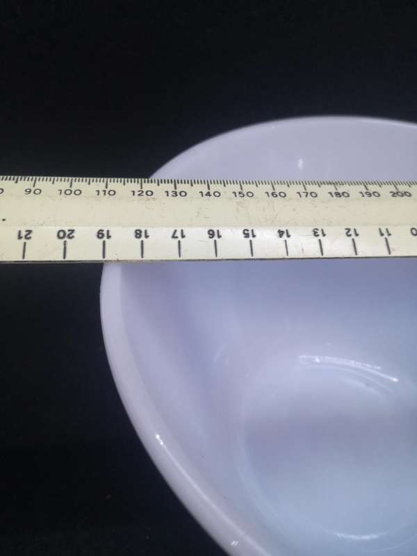 Vintage milk glass mixing bowl with blue detail