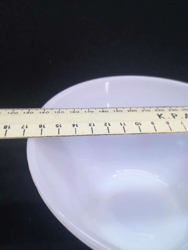Vintage milk glass mixing bowl with red detail