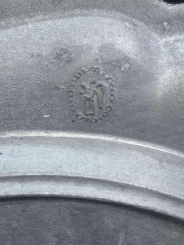 Vintage pewter plate
