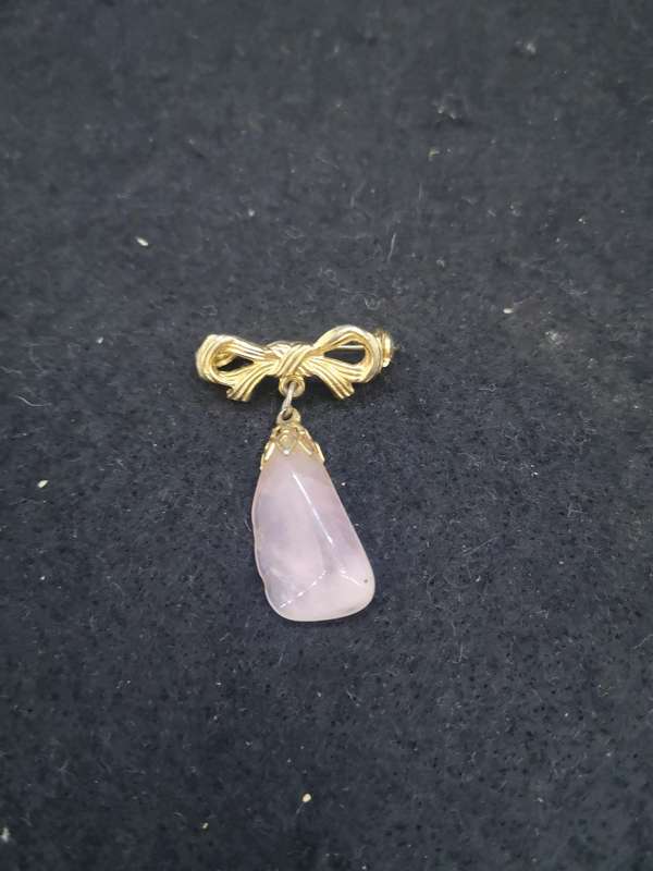 Pink stone brooch