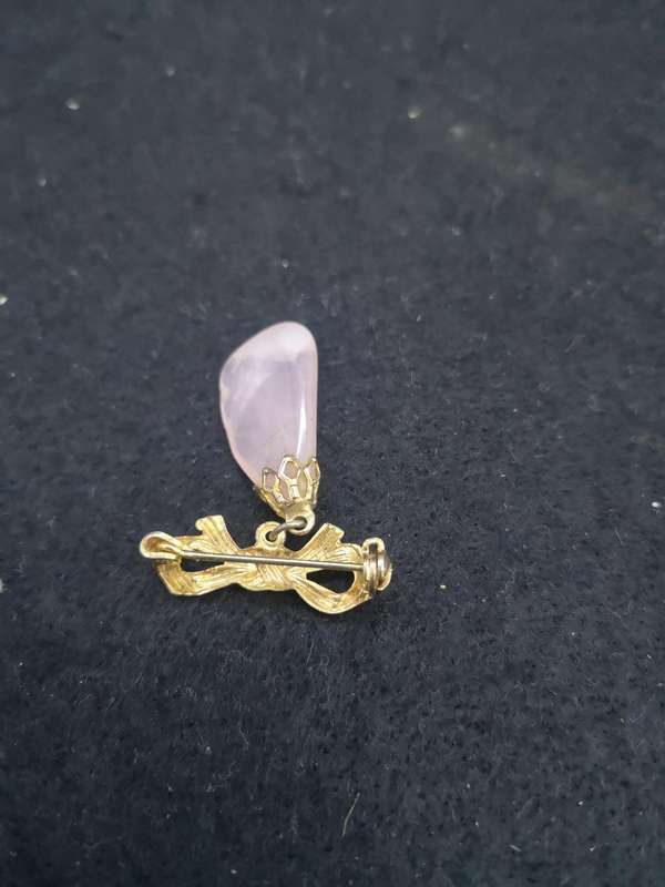 Pink stone brooch