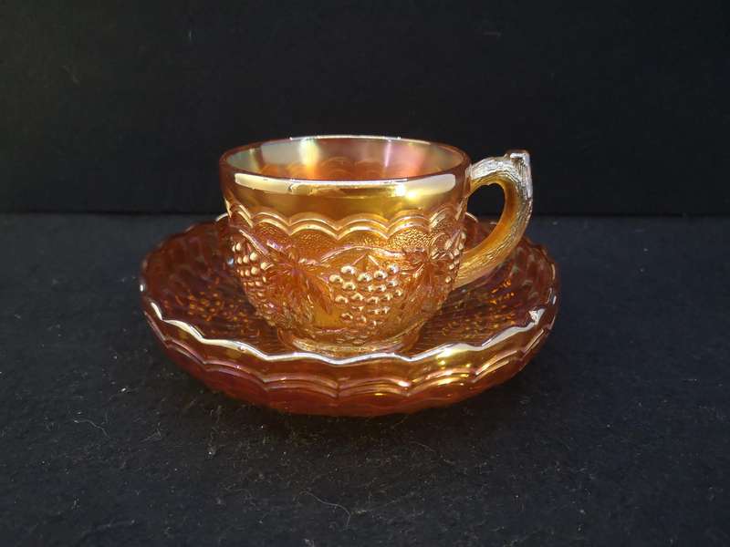 Carnival glass Imperial Grape cup and saucer