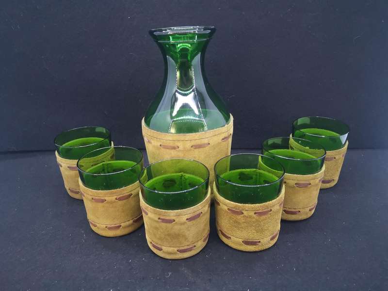 Green glass bottle decanter and set of 6 glasses encased in leather
