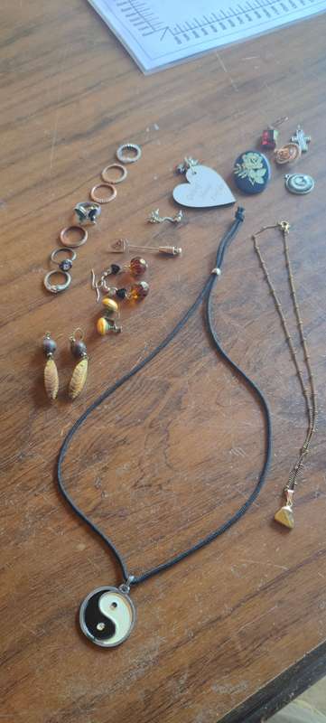 Lot of costume jewelry in octagonal jewelry box