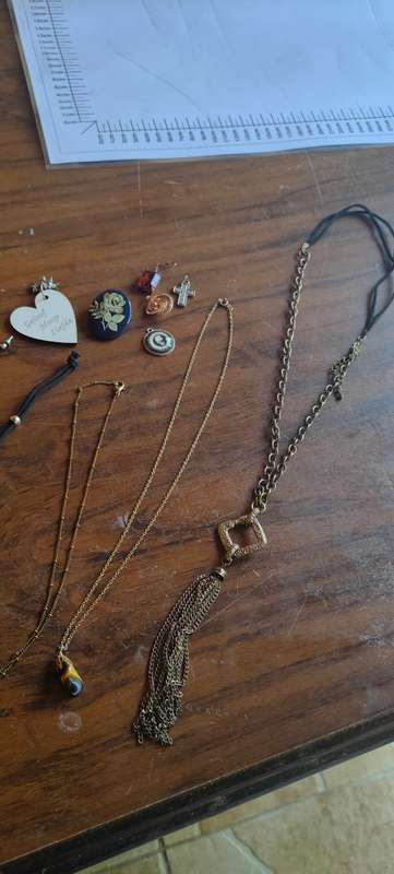 Lot of costume jewelry in octagonal jewelry box
