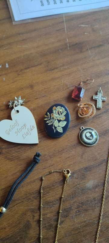 Lot of costume jewelry in octagonal jewelry box