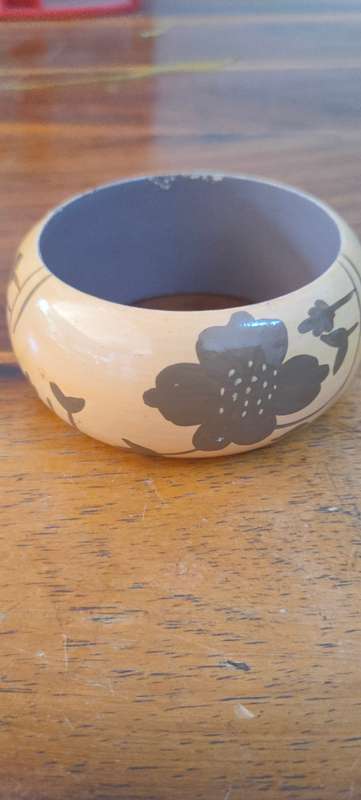 Large bangle with flower motif