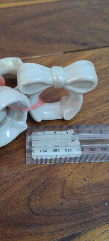 4 white serviette rings/holders