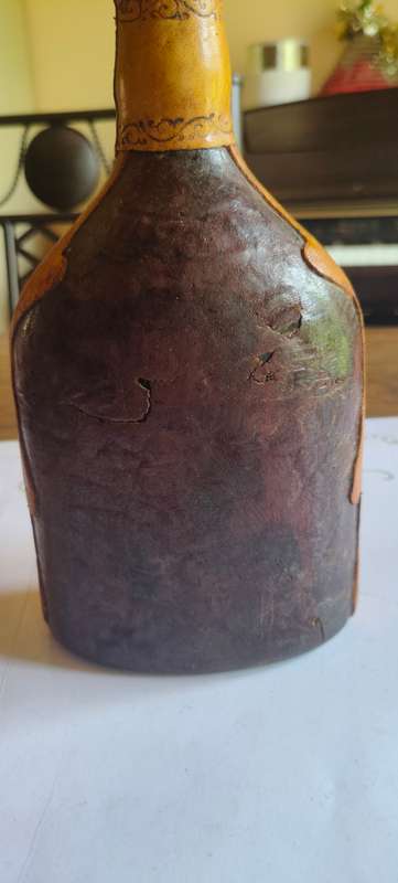Vintage Italian wrapped leather decanter