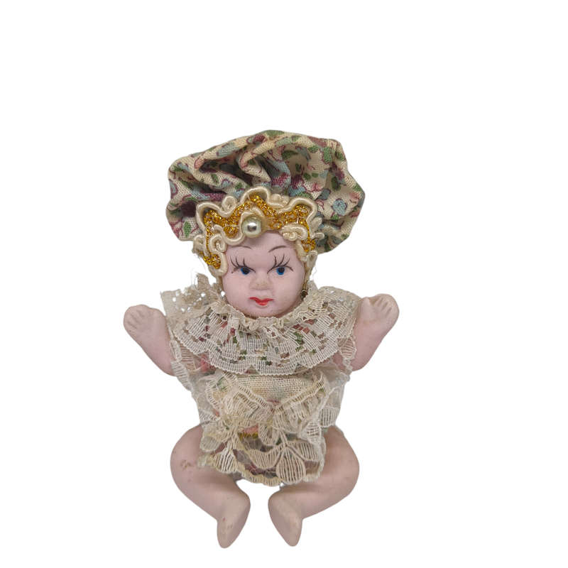 Vintage small baby/jester porcelain doll