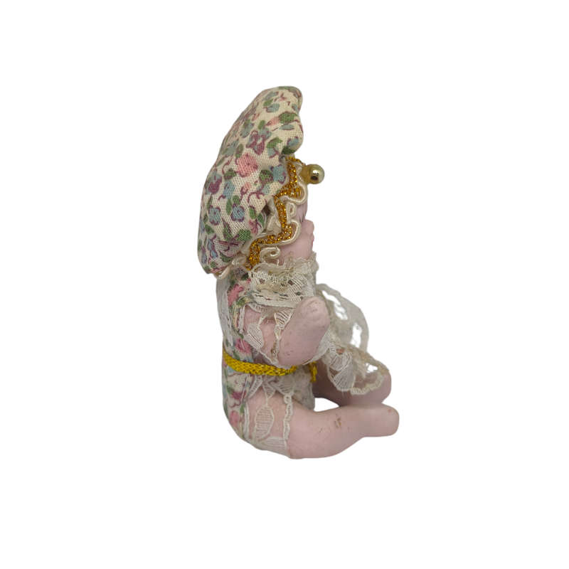 Vintage small baby/jester porcelain doll