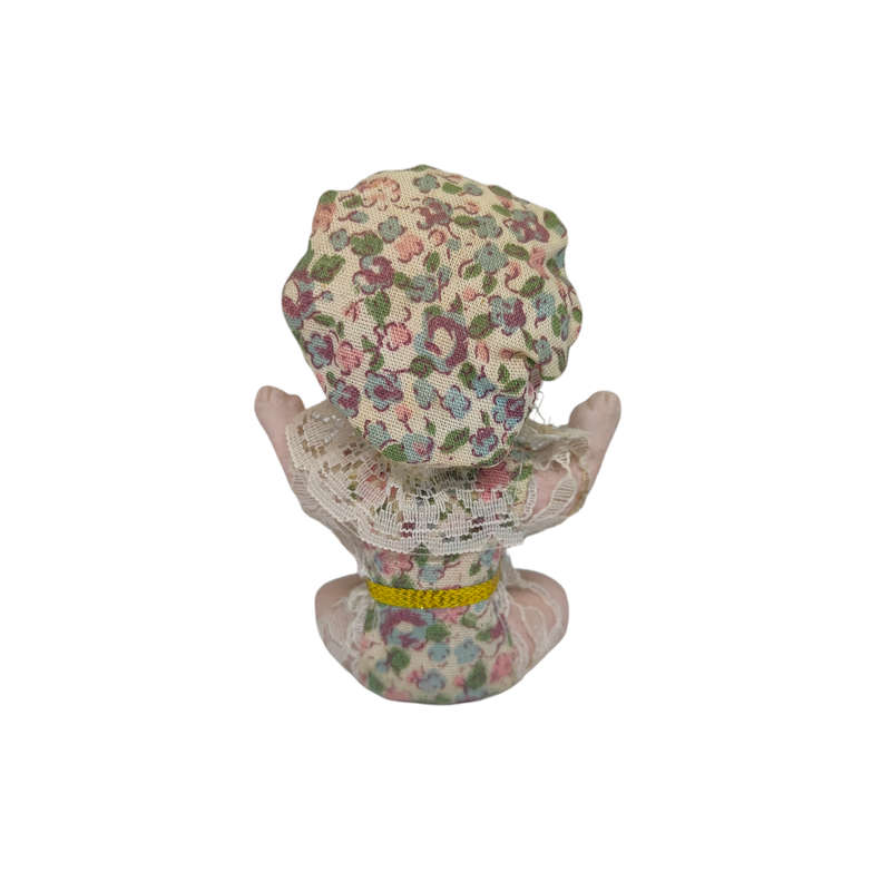 Vintage small baby/jester porcelain doll