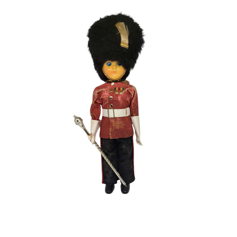 Vintage British royal guard souvenir doll with sleep eyes