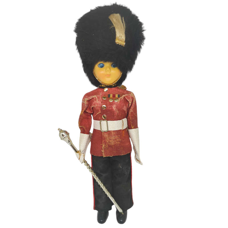 Vintage British royal guard souvenir doll with sleep eyes