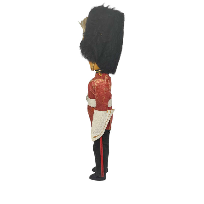 Vintage British royal guard souvenir doll with sleep eyes