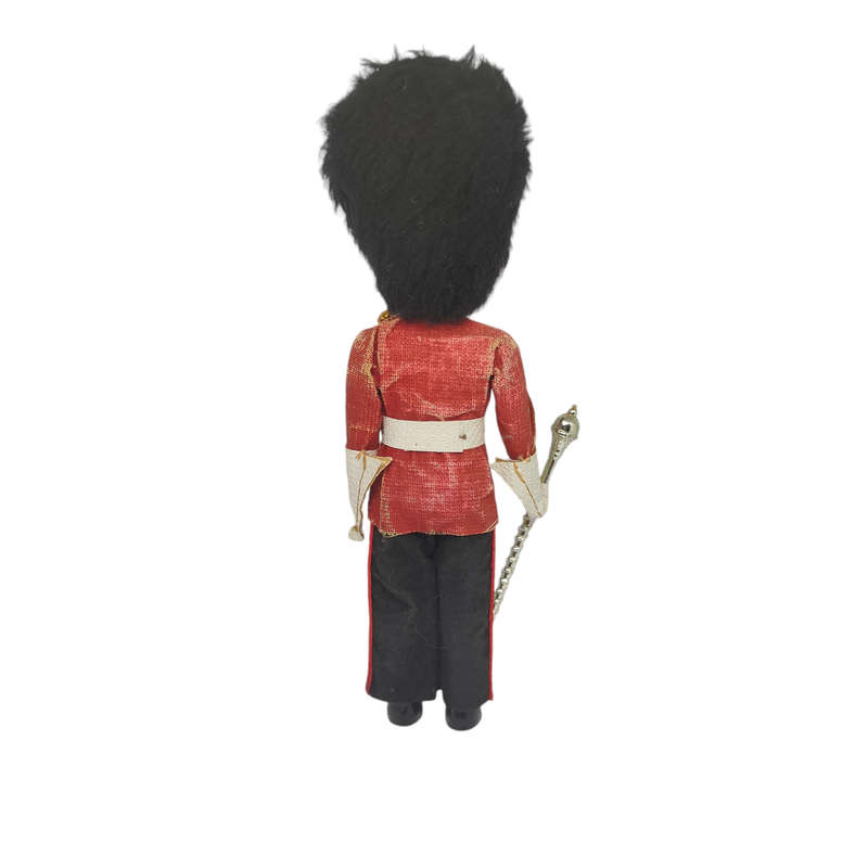 Vintage British royal guard souvenir doll with sleep eyes