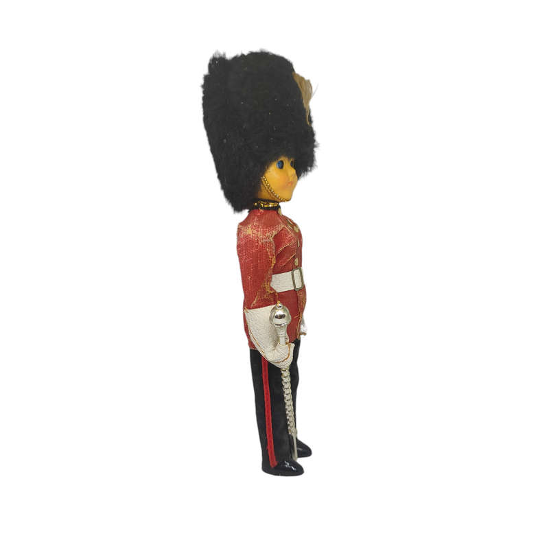 Vintage British royal guard souvenir doll with sleep eyes