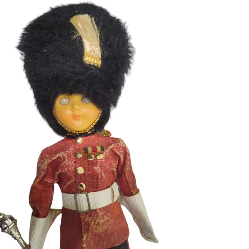 Vintage British royal guard souvenir doll with sleep eyes
