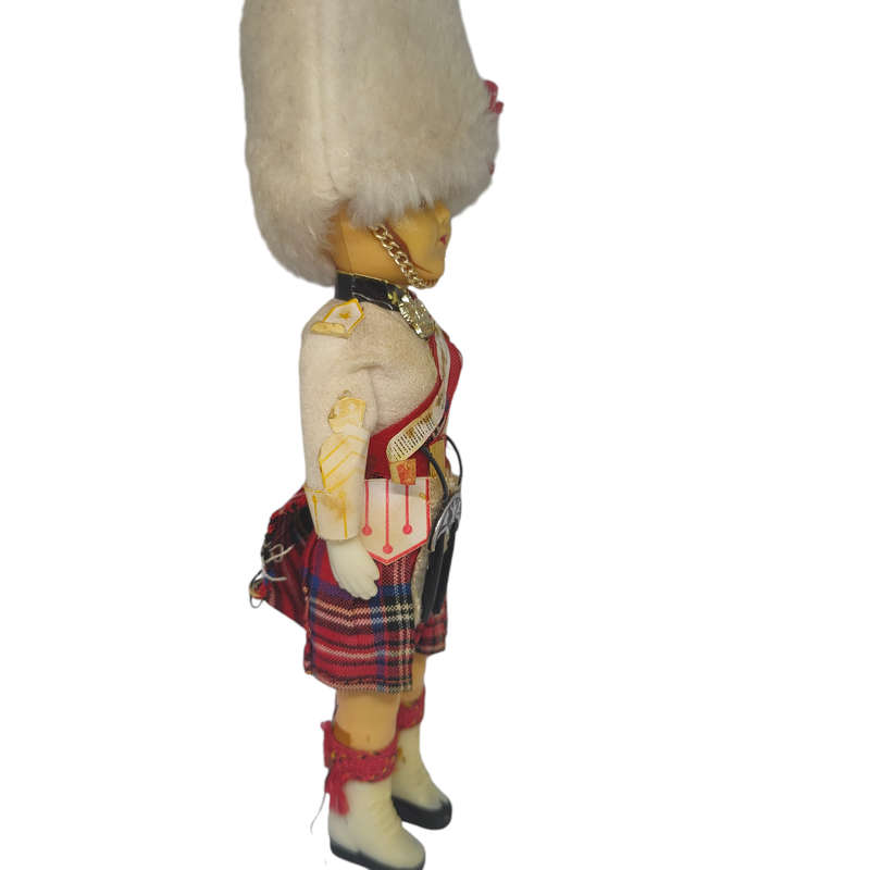 Vintage Scottish guard souvenir doll with sleep eyes