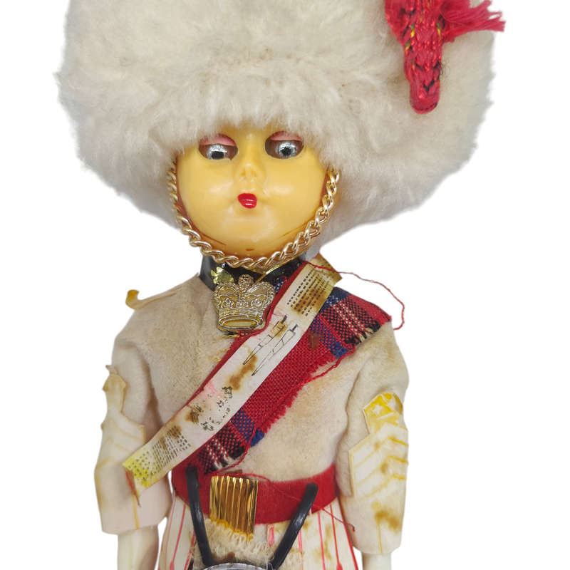 Vintage Scottish guard souvenir doll with sleep eyes
