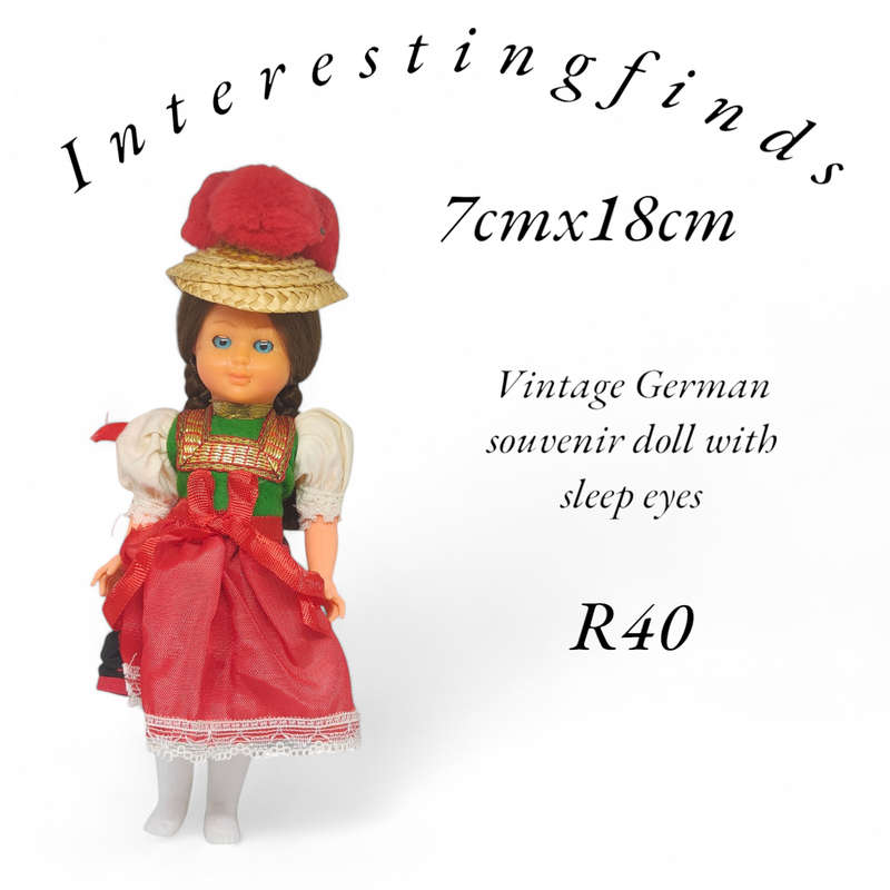 Vintage German souvenir doll with sleep eyes