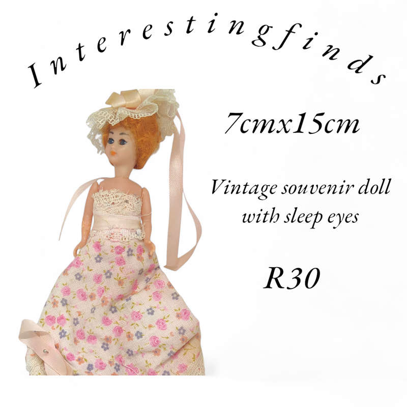 Vintage souvenir doll with sleep eyes