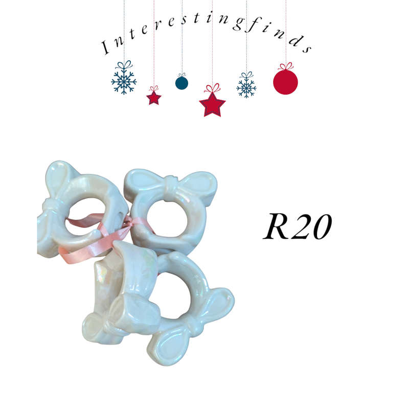 4 white serviette rings/holders