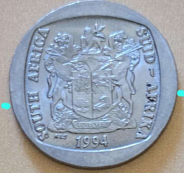1994 R5 ~ Presidential Inauguration ~ error coin struck on top of Inauguration R5 and Coat of Arms