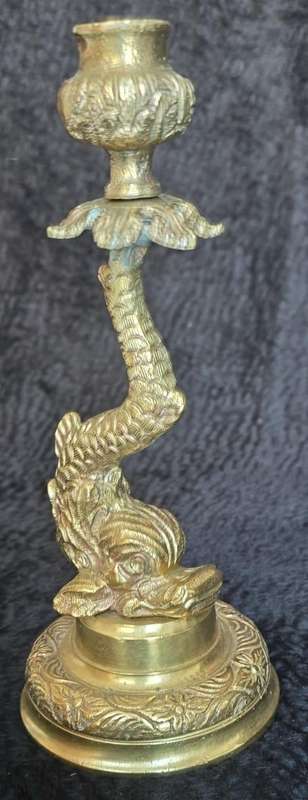 Vintage brass candlestick with dragon fish figure