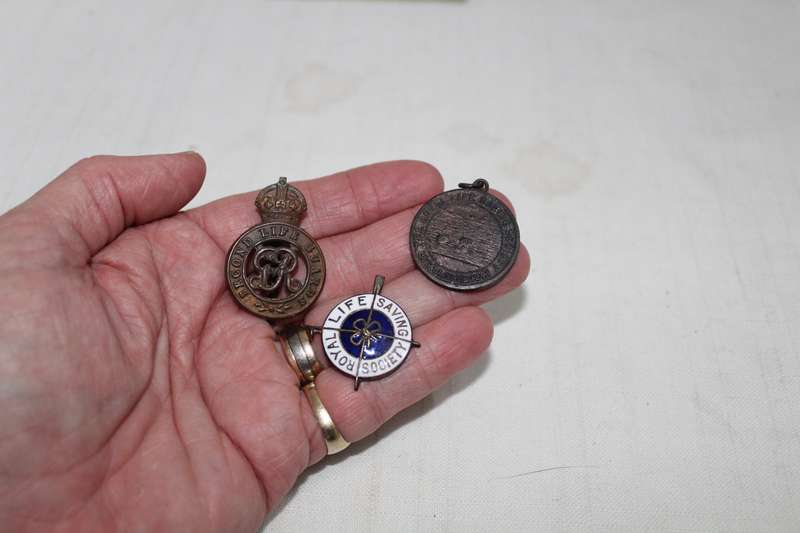 Life Saving medallion and 2 badges