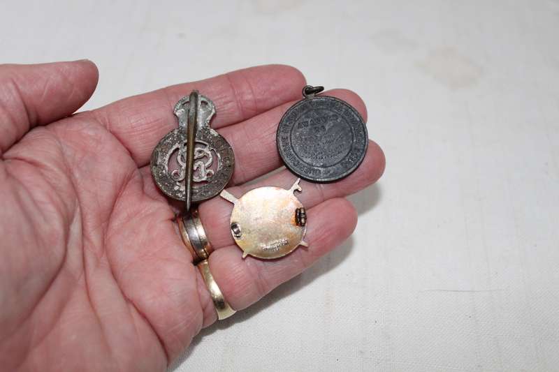 Life Saving medallion and 2 badges