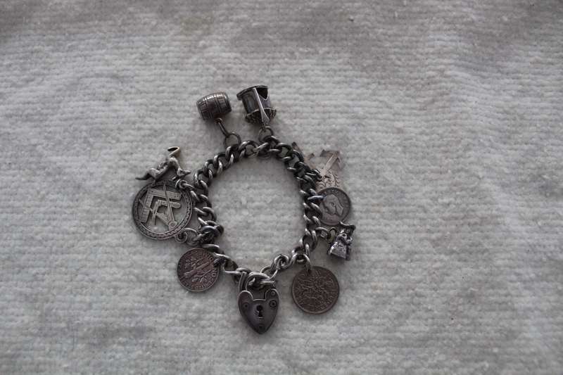 Sterling silver charm bracelet - 58.74grams! REDUCED!