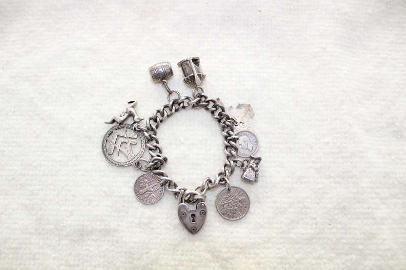 Sterling silver charm bracelet - 58.74grams! REDUCED!