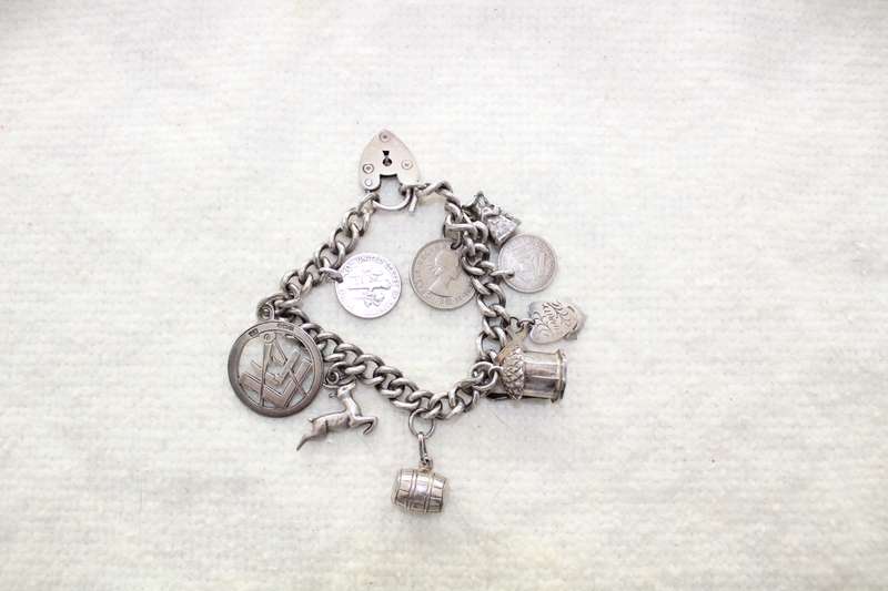 Sterling silver charm bracelet - 58.74grams! REDUCED!