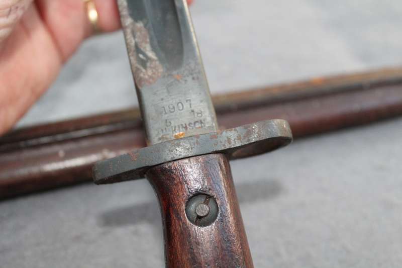 Bayonet dated 1907 (WW1?) with excellent scabbard. Reason for low price below.......