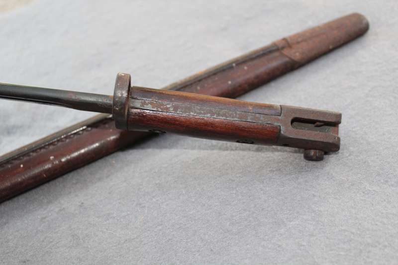 Bayonet dated 1907 (WW1?) with excellent scabbard. Reason for low price below.......