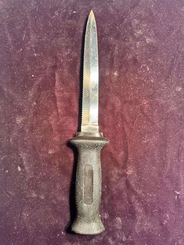 Vintage Virginia 4341 INOX diving knife with a serrated blade and sheath