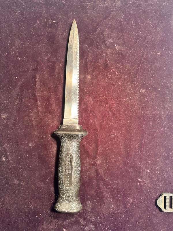 Vintage Virginia 4341 INOX diving knife with a serrated blade and sheath