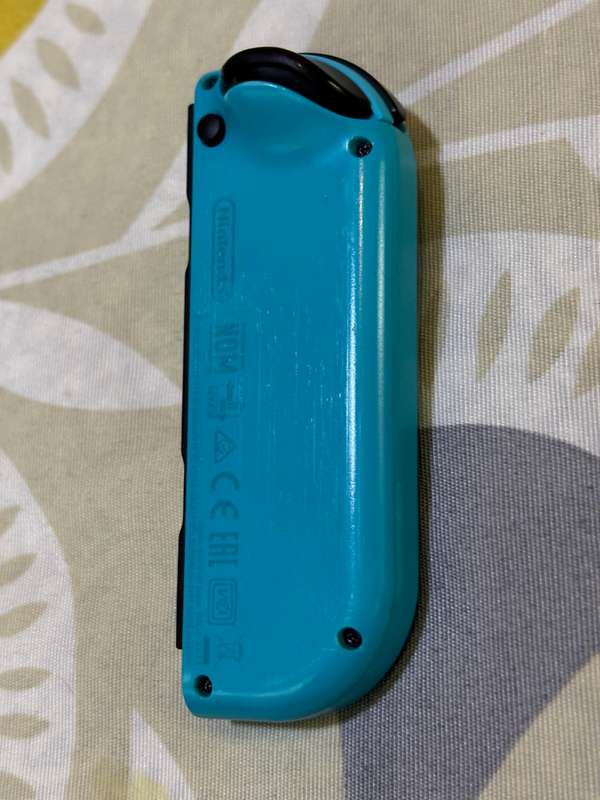neon blue Left Joy-Con controller for Nintendo Switch + wrist strap
