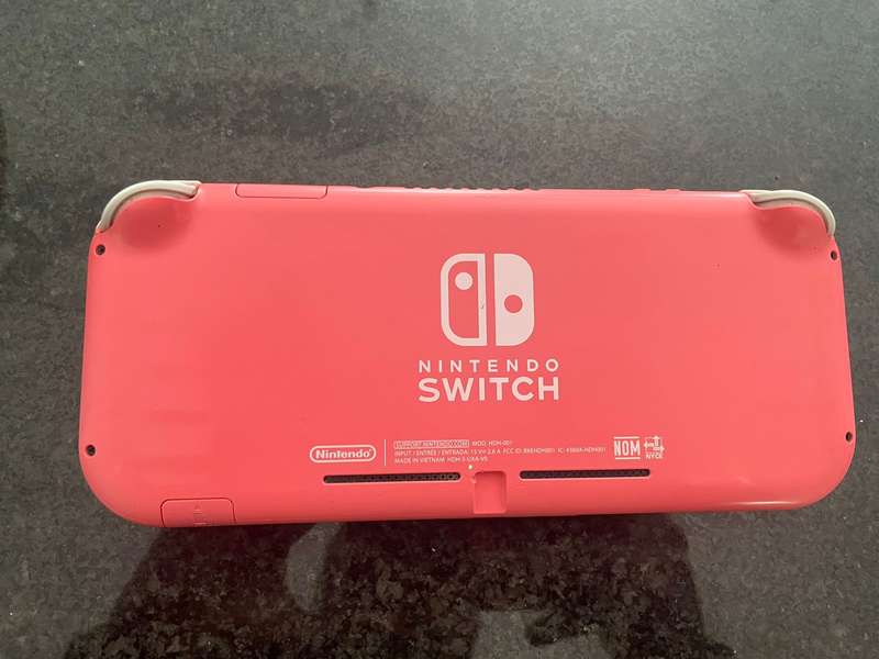 Coral Nintendo Switch Lite with 128GB micro SD card