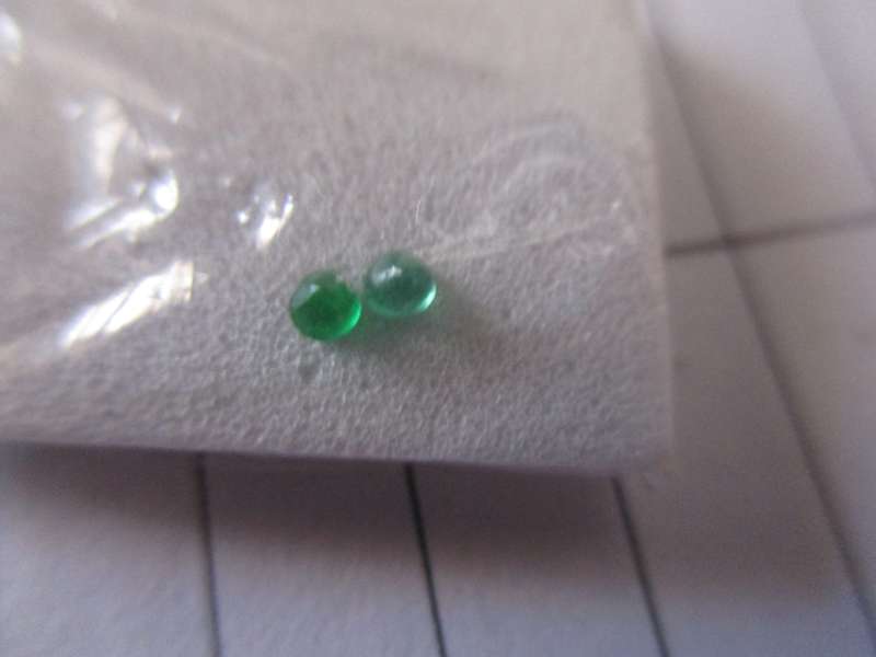 2.40 mm Round  2 pieces Emeralds .12ct