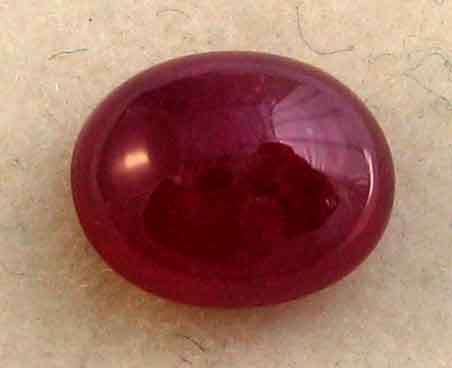 10.00x 8.00 mm Oval Cab. Ruby 3.94 ct.