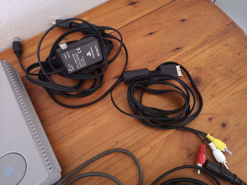 Original Sony Playstation 1 "phat" SCPH-9002 console including 4 original games