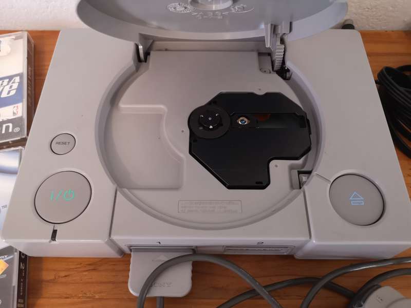 Original Sony Playstation 1 "phat" SCPH-9002 console including 4 original games