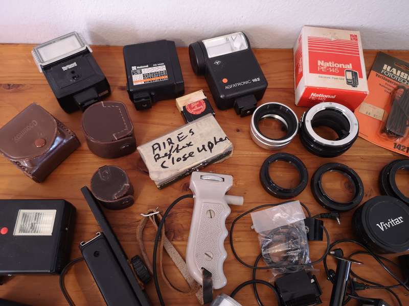 Vintage camera flashes, adapters, handles, etc.