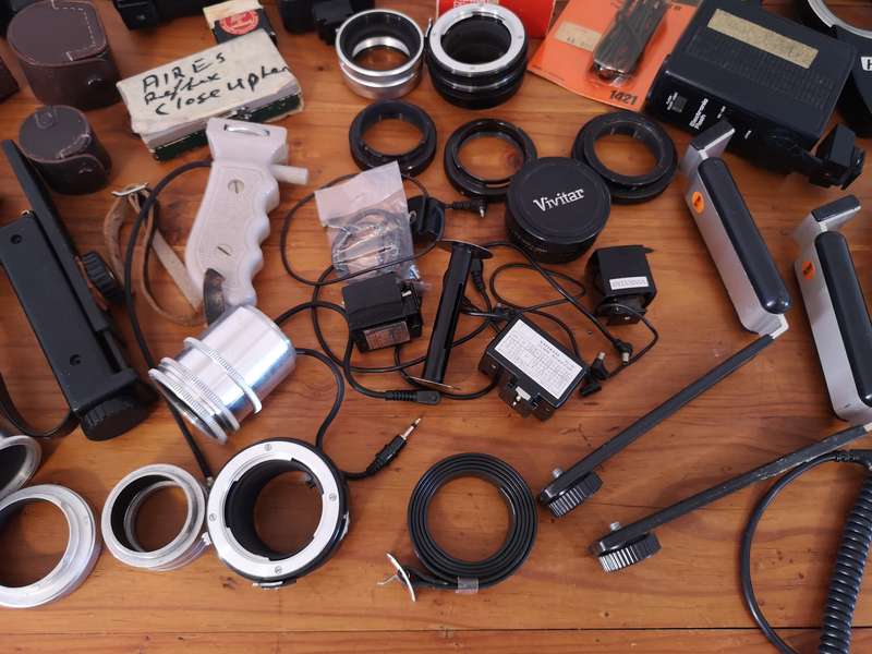 Vintage camera flashes, adapters, handles, etc.