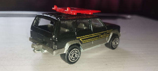Majorette Jeep Cherokee with Surfboards  - 1/60 Scale
