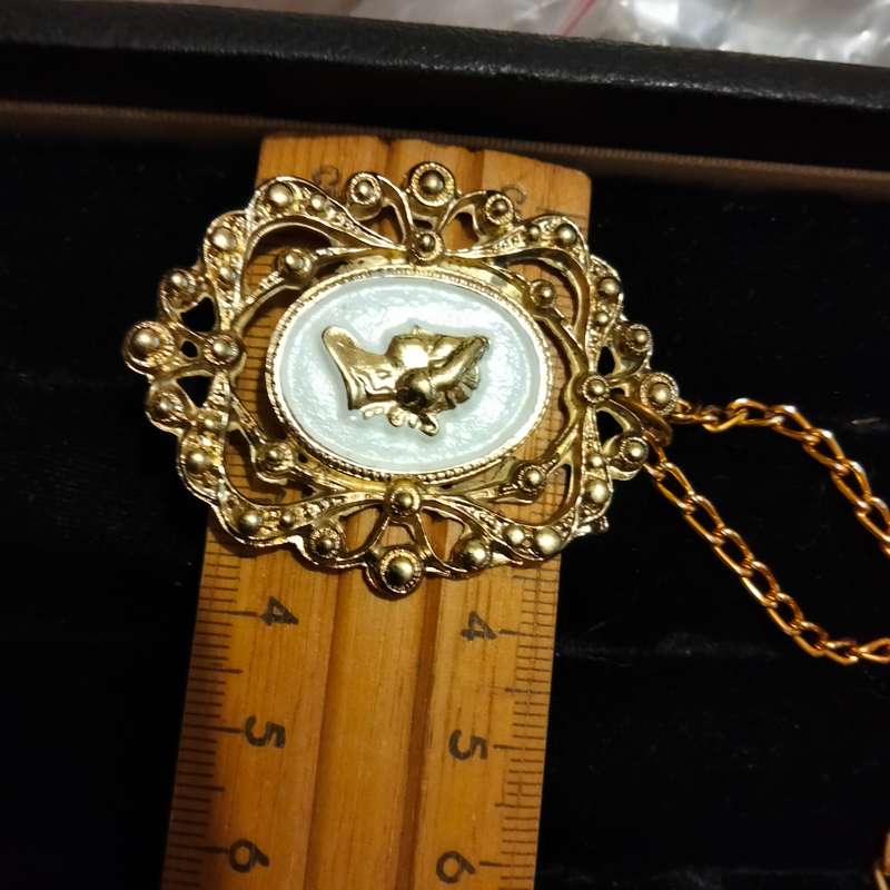 Necklace - Cameo Pendant gold tone on white metal embossed gold tone Lobster clasp metal chain